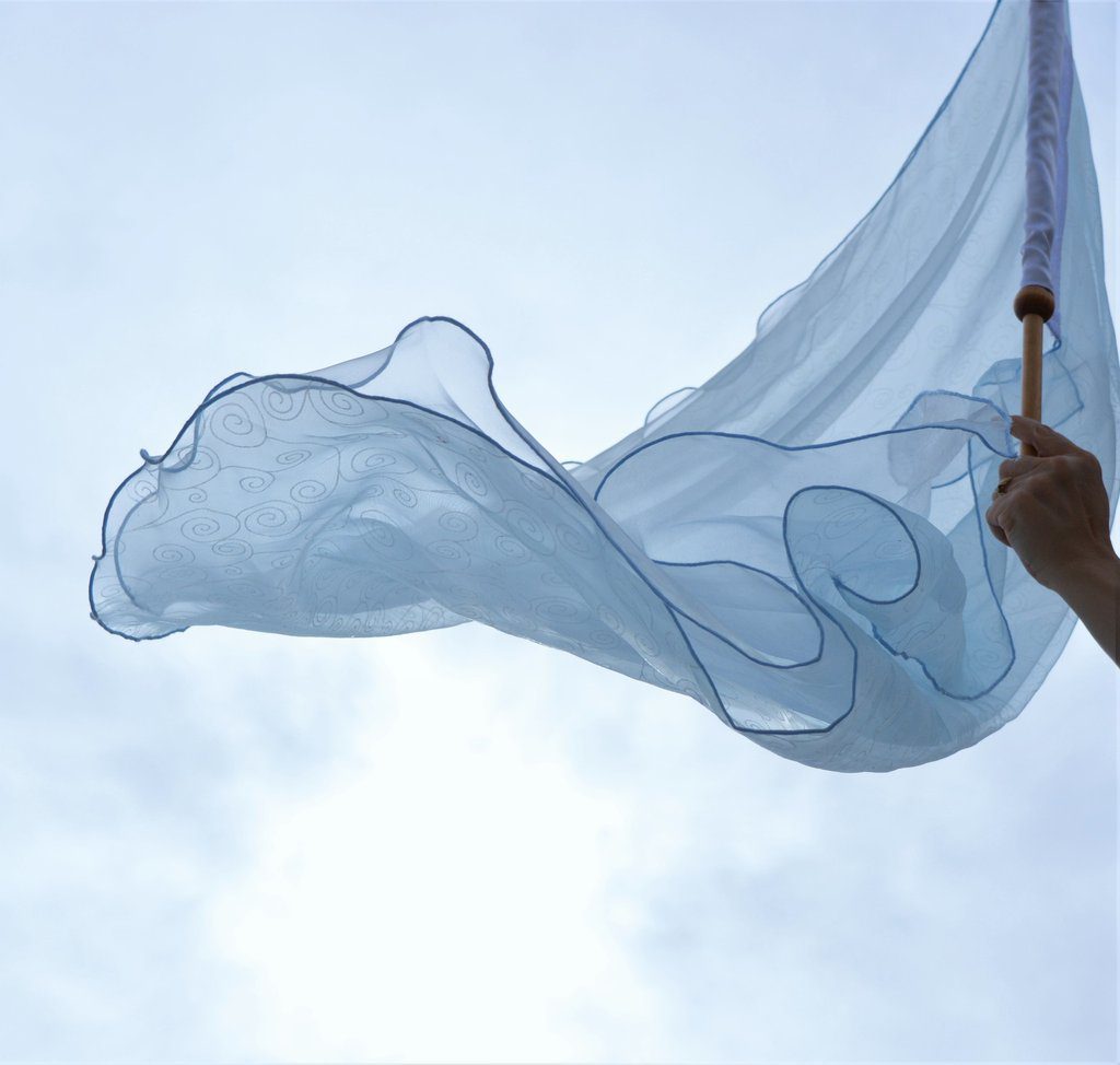Ruach - Breath of God - Worship Flag Being Waved Against the Sky