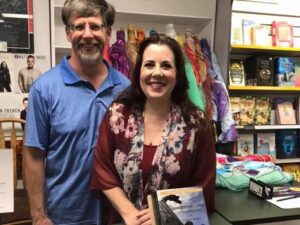 book signing and flags